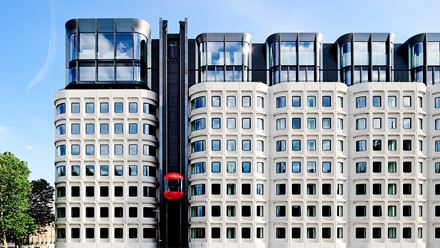 The iconic exterior red lift of The Standard, London hotel in Kings Cross. Credit: Mercy Amankwe. Image courtesy of The Standard.
